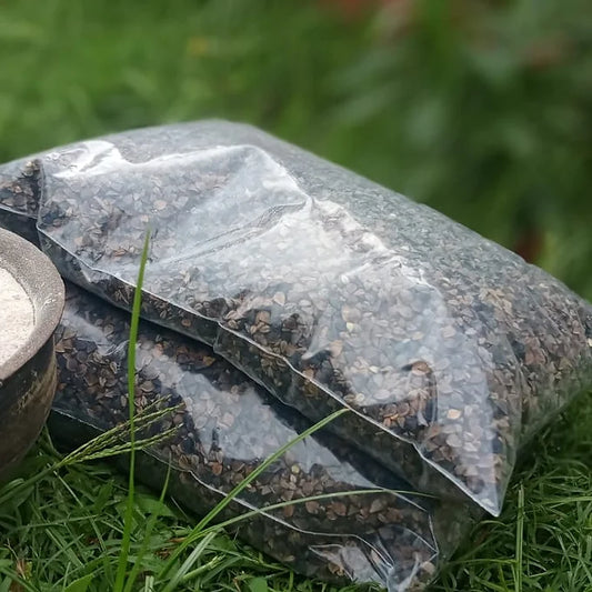 Fresh Organic Buckwheat Grains packets placed on green grass in Skardu Baltistan