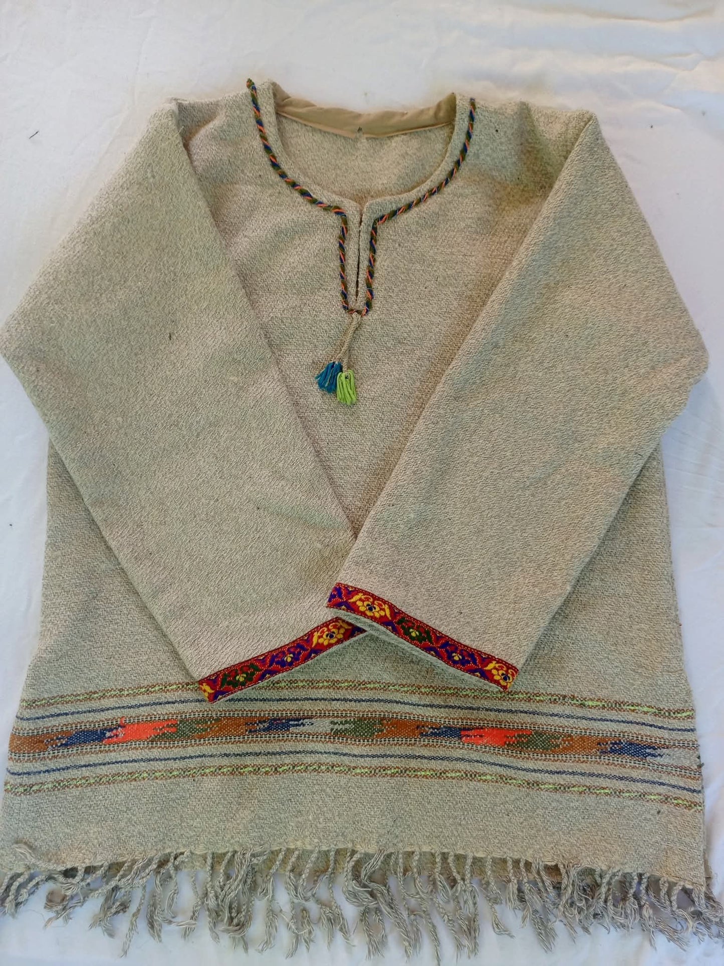 Handmade woolen unisex shirt beige color with traditional embroidery and fringe bottom - Authentic winter wear from Gilgit Baltistan