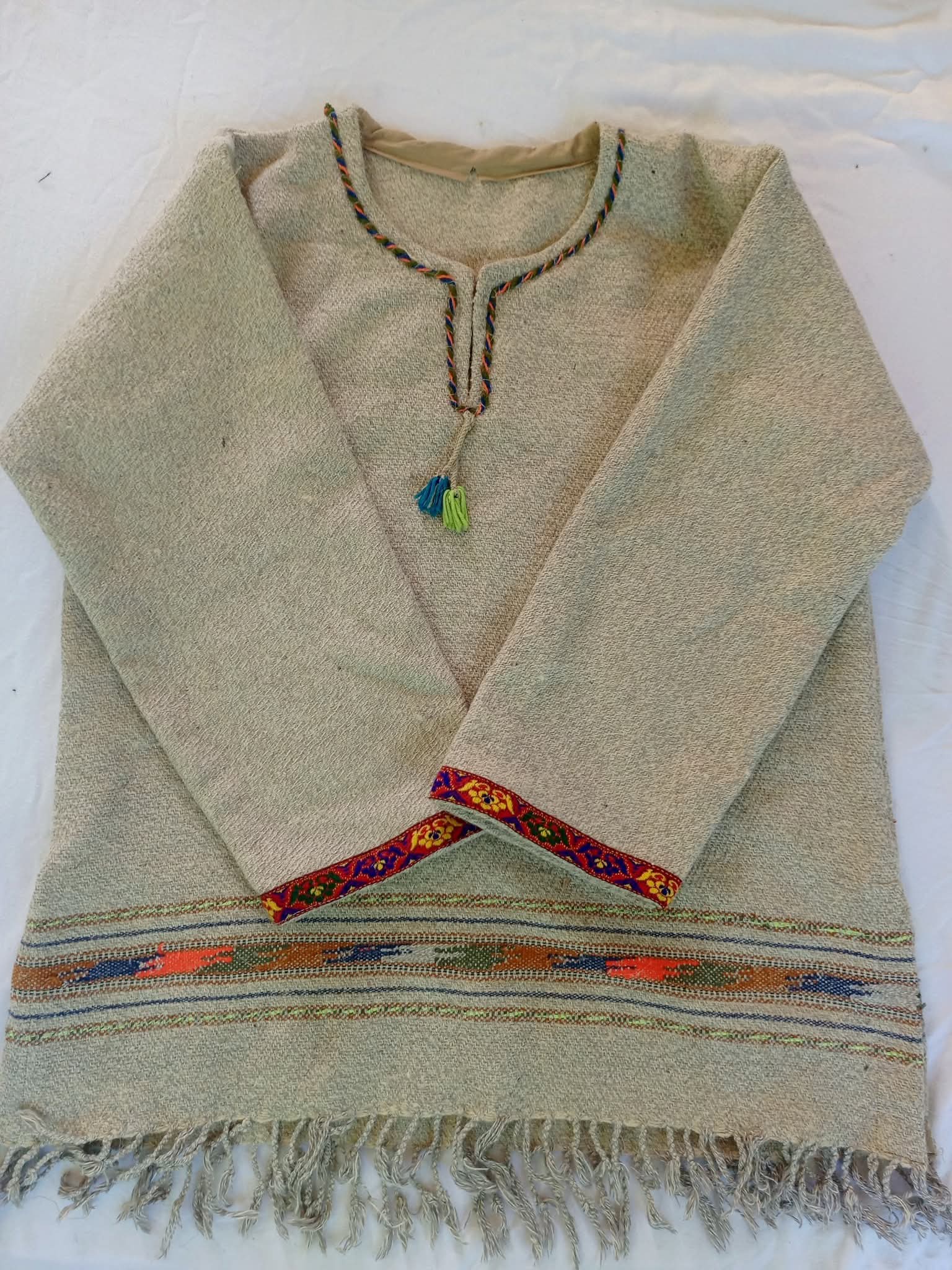 Handmade woolen unisex shirt beige color with traditional embroidery and fringe bottom - Authentic winter wear from Gilgit Baltistan